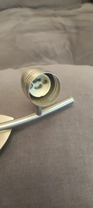 Foco doble de metal plateado