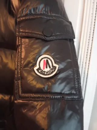 Plumífero impermeable con capucha