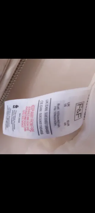 Chaqueta larga acolchada beige mujer