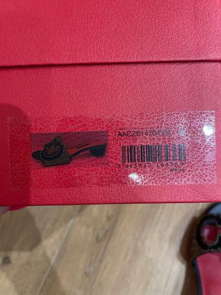 Sandalias Carolina Herrera negro y plata 38