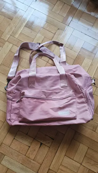 Bolsa de viaje rosa