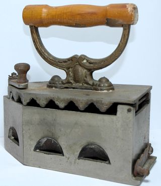 plancha de carbón antigua