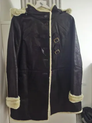 Pelliza de piel marrón forrada de pelo