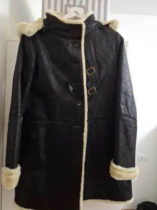 Pelliza de piel marrón forrada de pelo