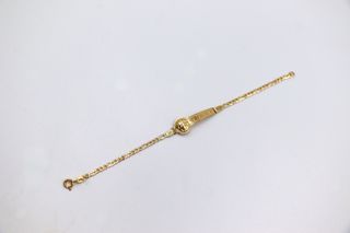 ESCLAVA DE NIÑO MEDUSA Y GRECA. Oro 18k.