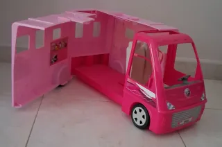 Caravana de muñecas rosa