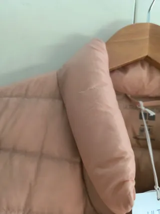 Plumas Uniqlo Rosa Claro