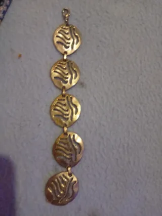Pulsera de plata con diseño calado