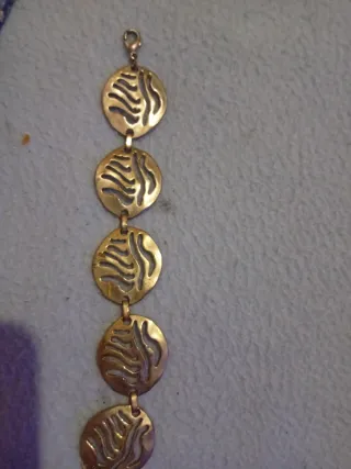 Pulsera de plata con diseño calado