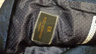 Traje de novio azul con chaleco