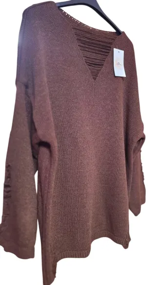 Jersey marrón de punto con hilos