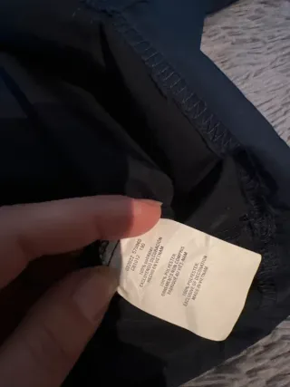 Giacca a vento Champion nera con cappuccio