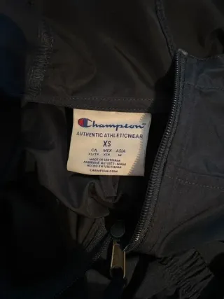 Giacca a vento Champion nera con cappuccio