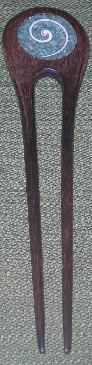 Fermacapelli con spirale