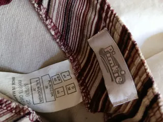 Minifalda de pana con hebillas