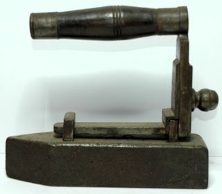 Plancha de carbón antigua.