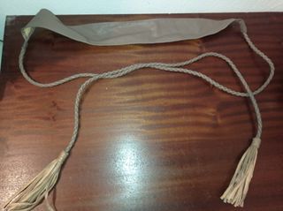 Cinturón trenzado con flecos