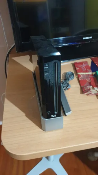 Nintendo Wii + Wii Balance + Wii Fit Plus