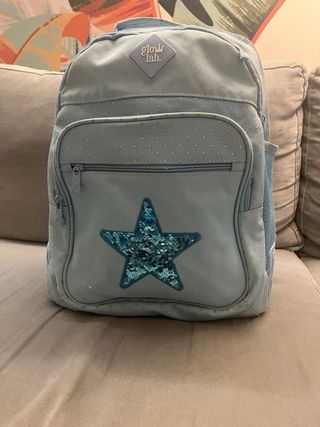 Mochila escolar azul con estrellas y lentejuelas
