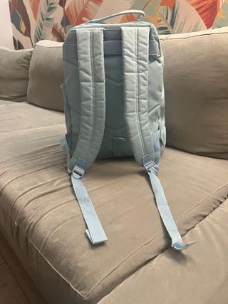 Mochila escolar azul con estrellas y lentejuelas