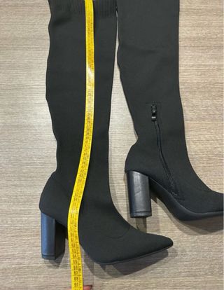 Stivali neri alti al ginocchio