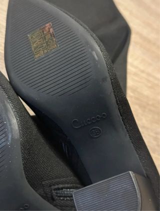 Stivali neri alti al ginocchio