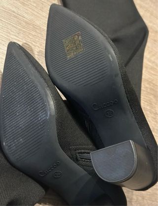 Stivali neri alti al ginocchio