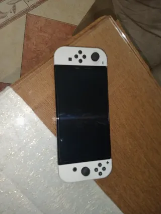 Nintendo Switch OLED Mario Kart 8 Deluxe + Super M