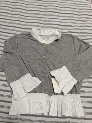 Chaqueta gris de punto