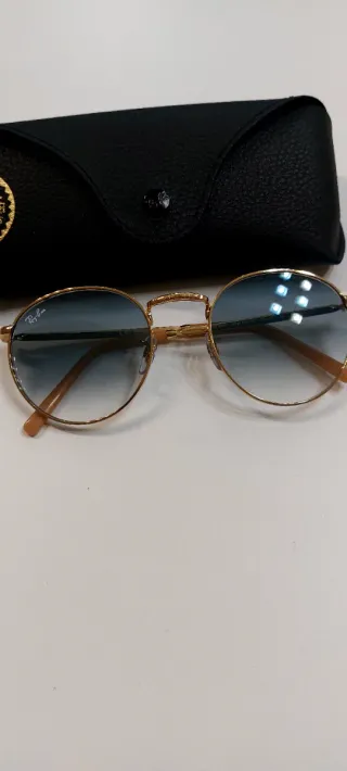 Gafas de sol Ray-Ban redondas doradas