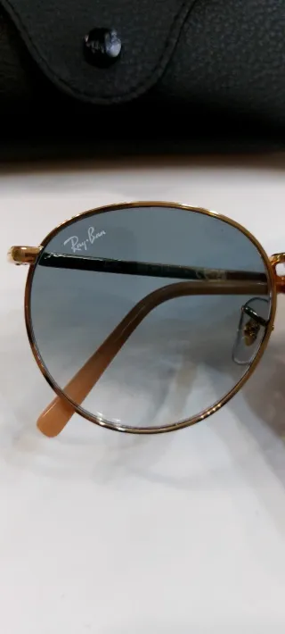 Gafas de sol Ray-Ban redondas doradas