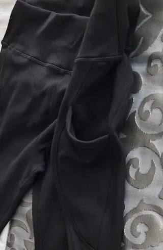 Leggings deportivos negros con bolsillos