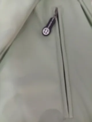 Chubasquero verde sin estrenar