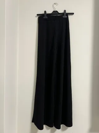 Pantalón ancho negro brillante Glowrias