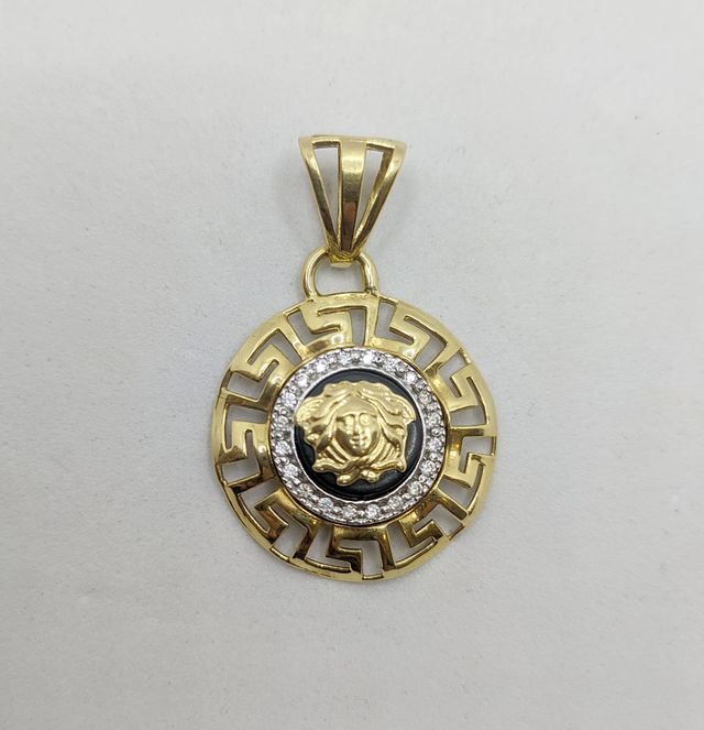 Colgante de oro combinado 18k circonitas, 5.82 g.