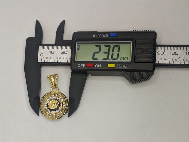 Colgante de oro combinado 18k circonitas, 5.82 g.
