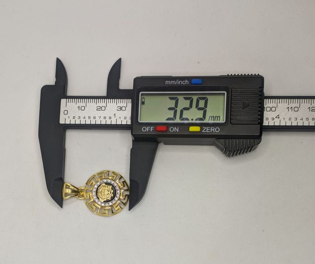 Colgante de oro combinado 18k circonitas, 5.82 g.