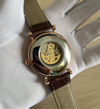 Reloj Seiko Presage Open Heart automático.