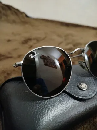 Gafas de sol redondas plateadas