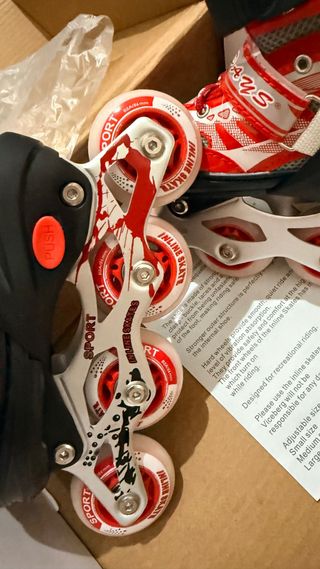 Pattini in linea rossi regolabili