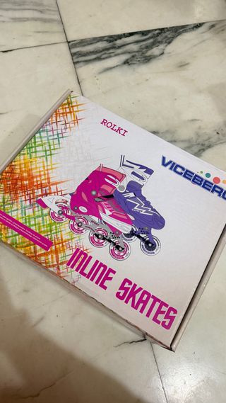 Pattini in linea rossi regolabili