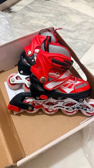 Pattini in linea rossi regolabili