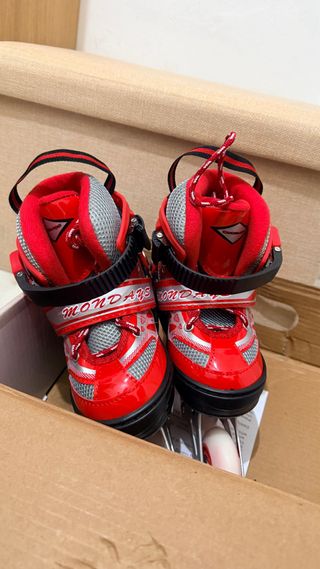 Pattini in linea rossi regolabili