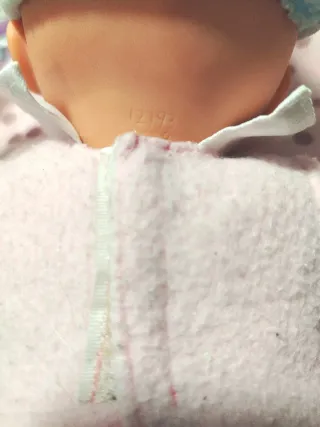 Muñeca bebé con hamaca