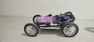 Silla de paseo para muñecos morada