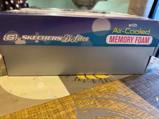 Zapatillas Skechers D'Lites Blancas y Doradas