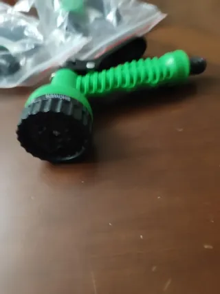 Pistola de riego verde 8 funciones nueva estrenar