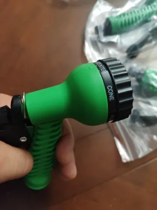 Pistola de riego verde 8 funciones nueva estrenar