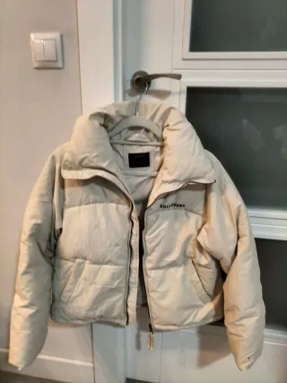 Chaqueta beige acolchada de niña