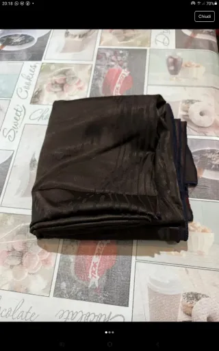 Tessuto marrone con disegni 150x150